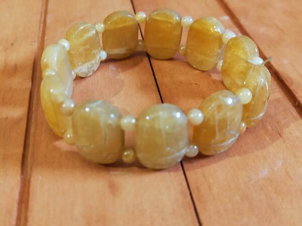pulsera elástica mineral de cabujones ovalados de calcita amarilla elas