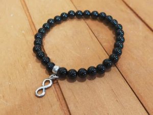 Pulsera plata y onix simbolo del infinito