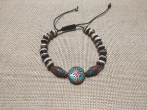 Pulsera Mala de hueso con adornos tibetanos