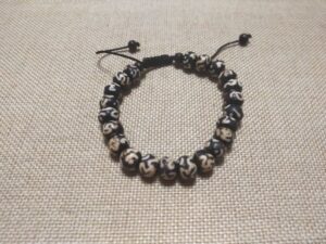 Pulsera Mala de hueso con símbolo Om